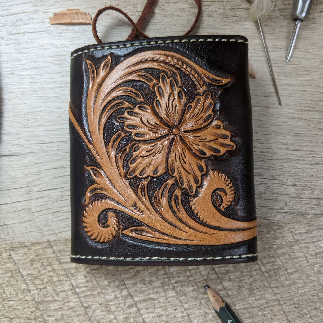 Handmade men's all leather trifold wallet with flower tooled design