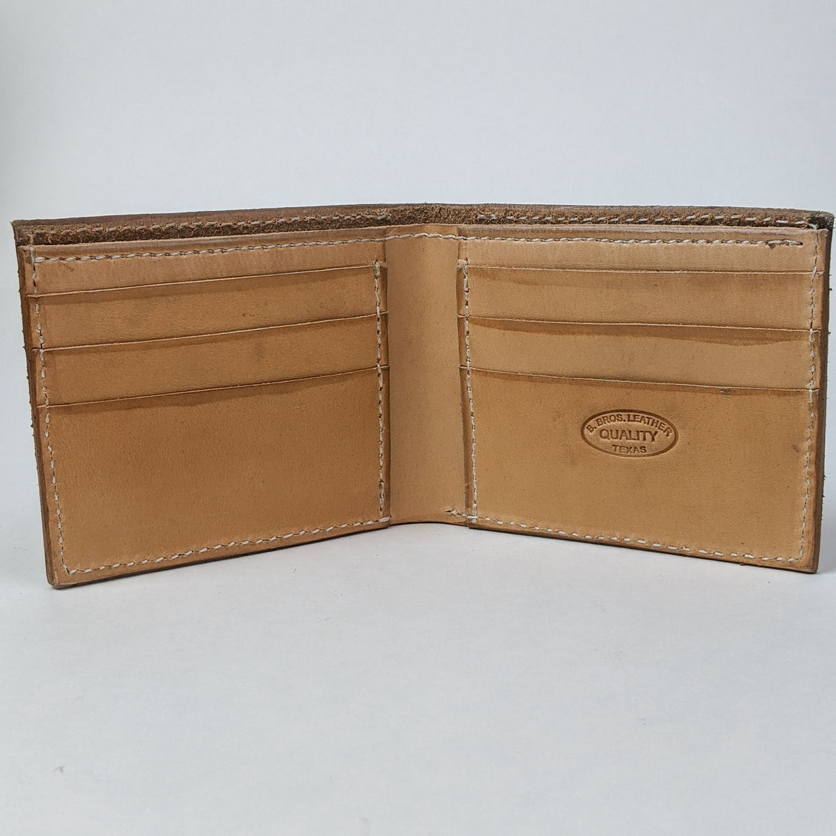 Handmade leather bifold wallet rough out with border design