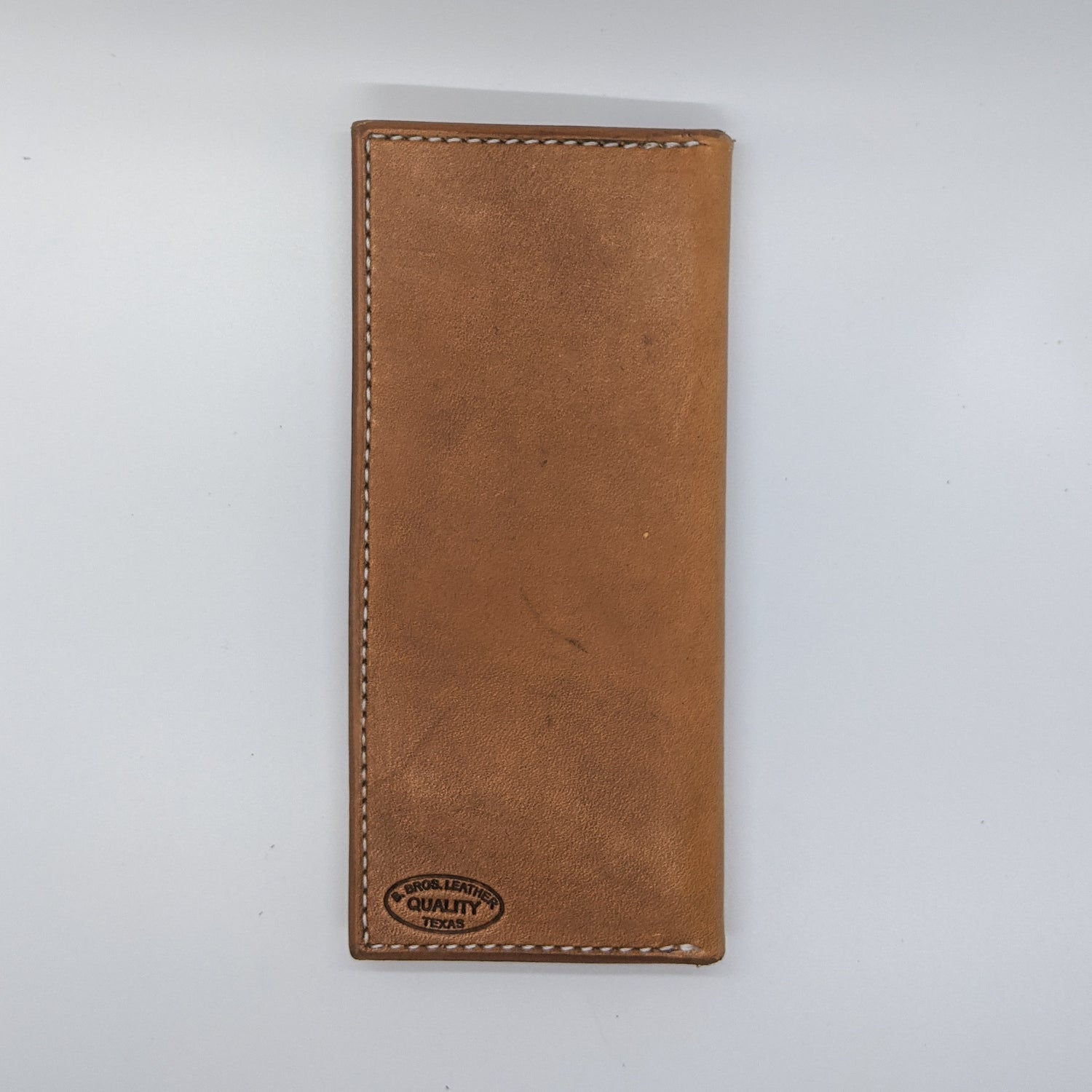 Floral and geometric tooled roper style leather wallet