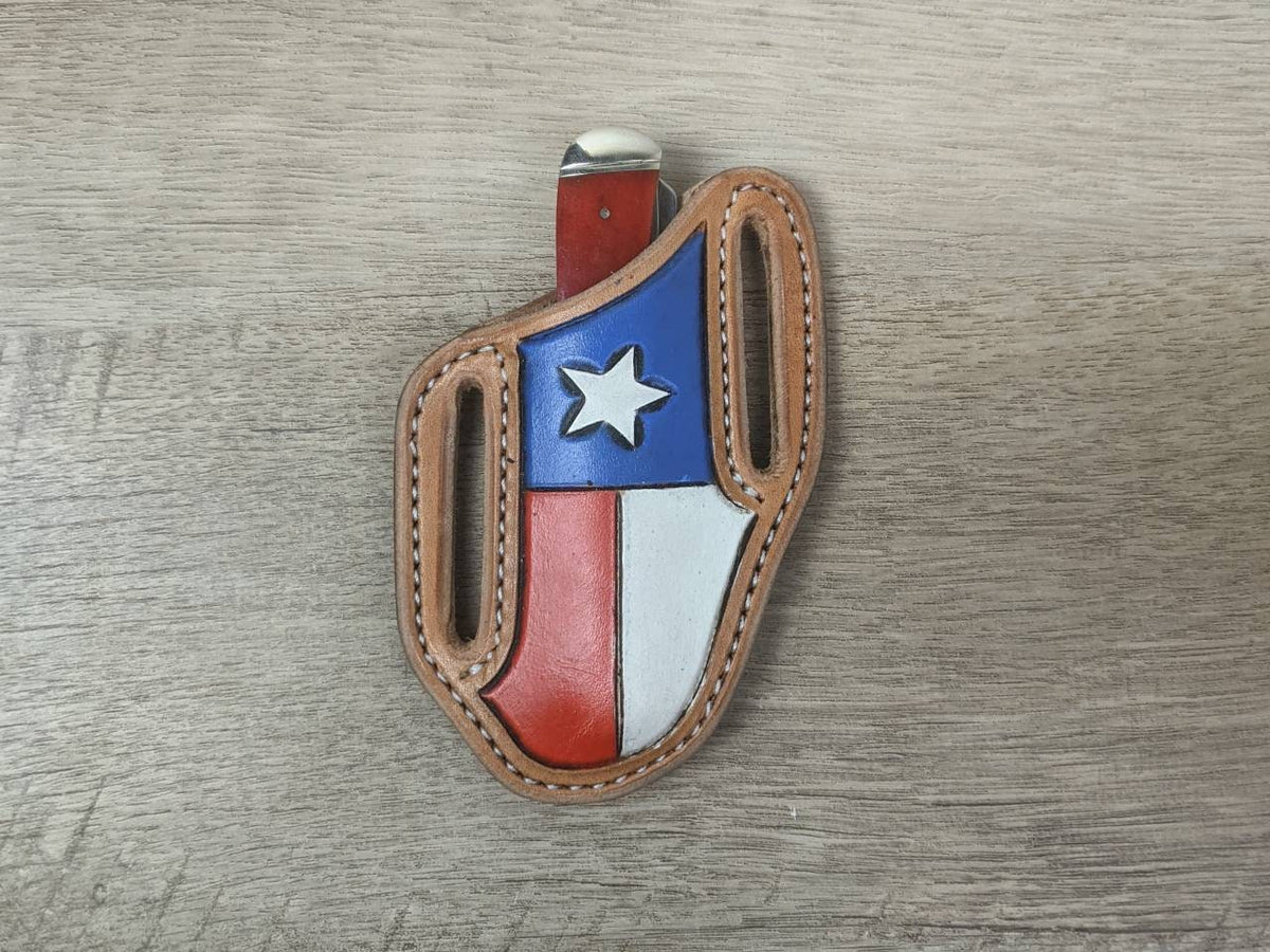 Red bone handled Rough Rider Trapper knife with matching Texas flag Leather Pancake Style sheath