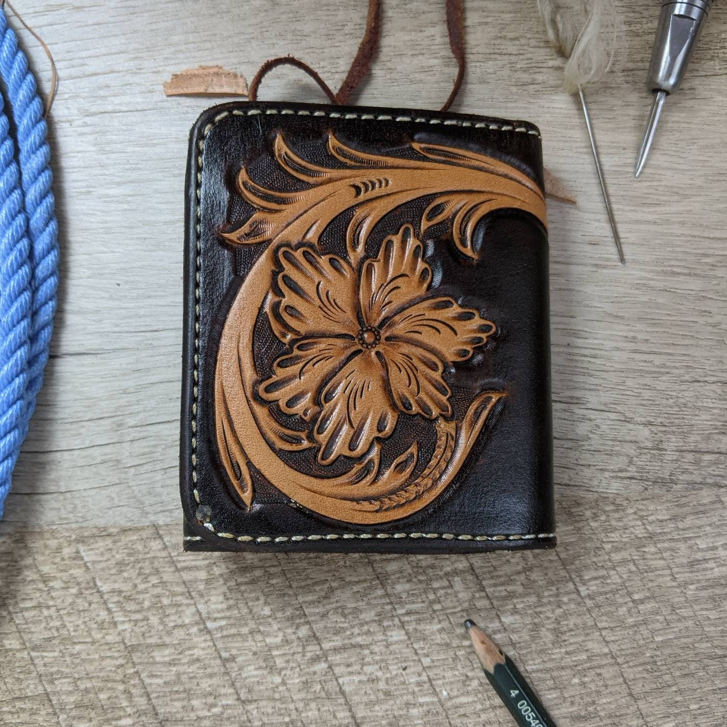 Handmade men's all leather trifold wallet with flower tooled design