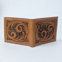 Handmade leather bifold wallet with western tooled pattern durable leather to last a several years