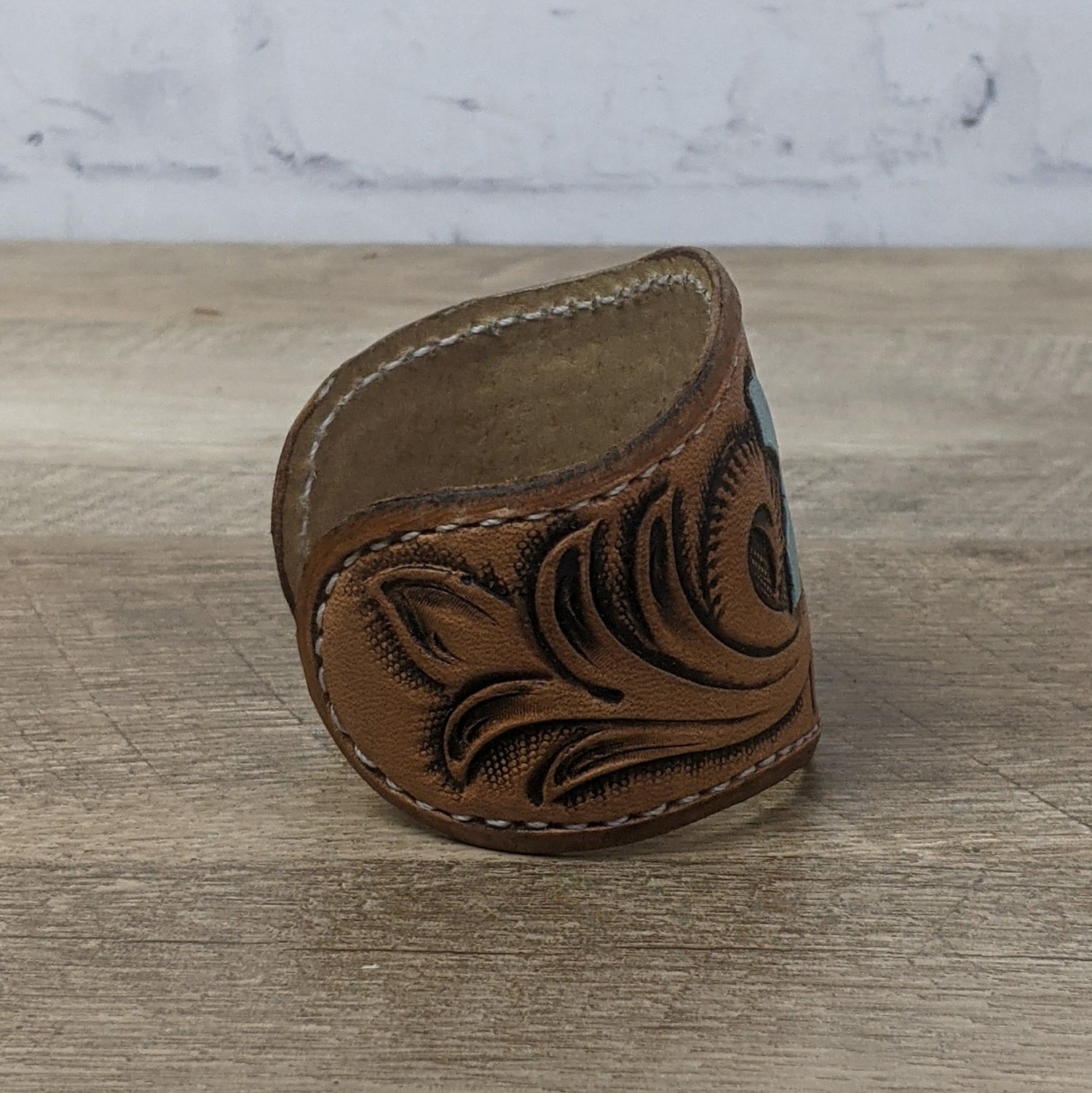 leather cuff made from brown tooled leather. leather bracelet wristband
