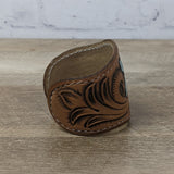 leather cuff made from brown tooled leather. leather bracelet wristband