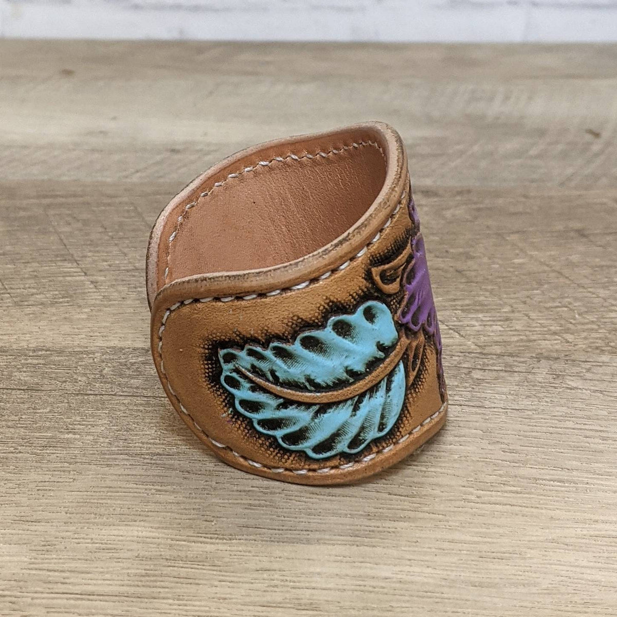 Purple and blue tooled leather cuff bracelet