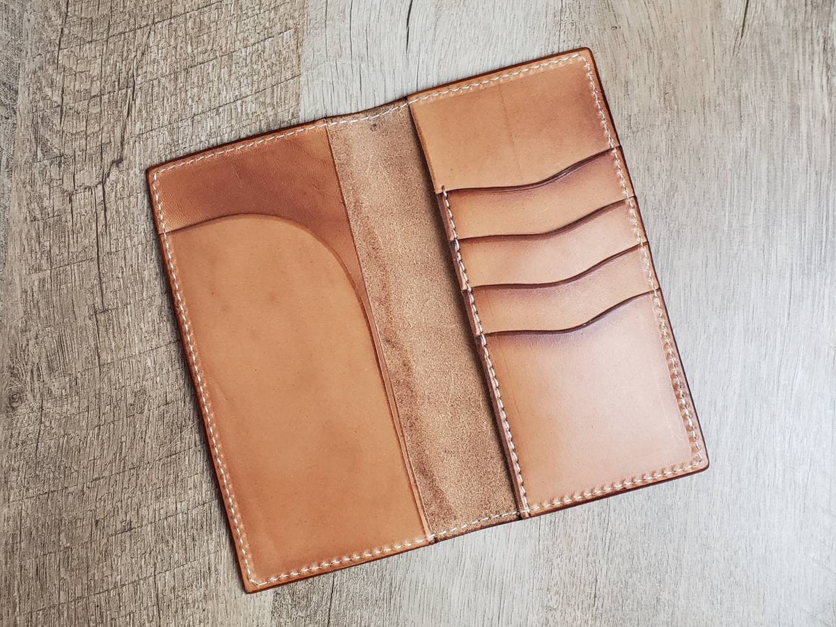 Tall leather roper wallet with weave tooled pattern and turquoise skull and headdress