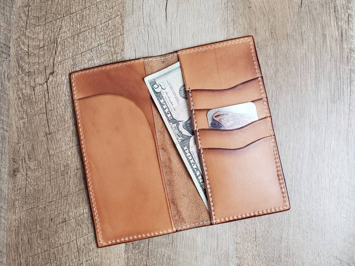 Tall leather roper wallet with weave tooled pattern and turquoise skull and headdress