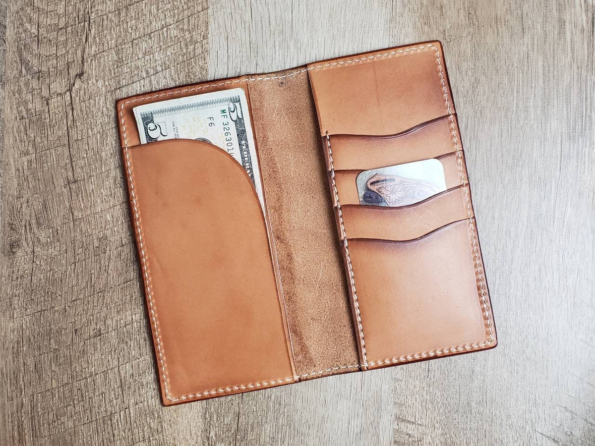 Tall leather roper wallet with weave tooled pattern and turquoise skull and headdress