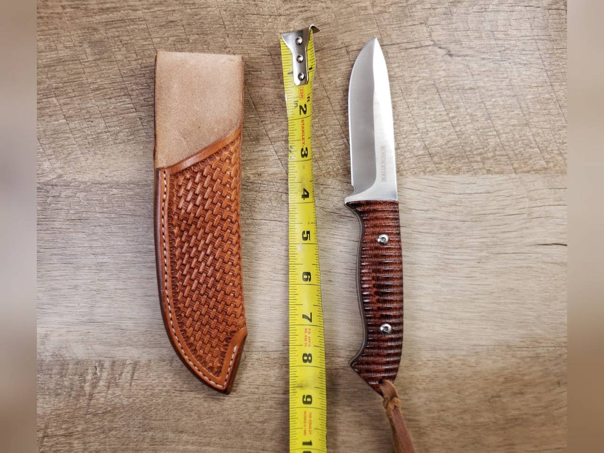Rough rider hunting knife with basket stamped straight hang leather sheath