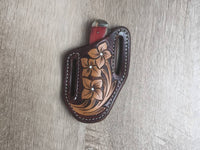 Red bone handled Rough Rider Trapper knife with matching painted floral carved chocolate Leather Pancake Style sheath